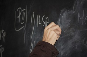 800px-Teacher-writing-on-blackboard564